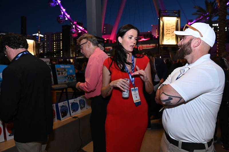 Attendees talking at party on the plaza