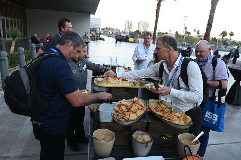 Attendees getting food